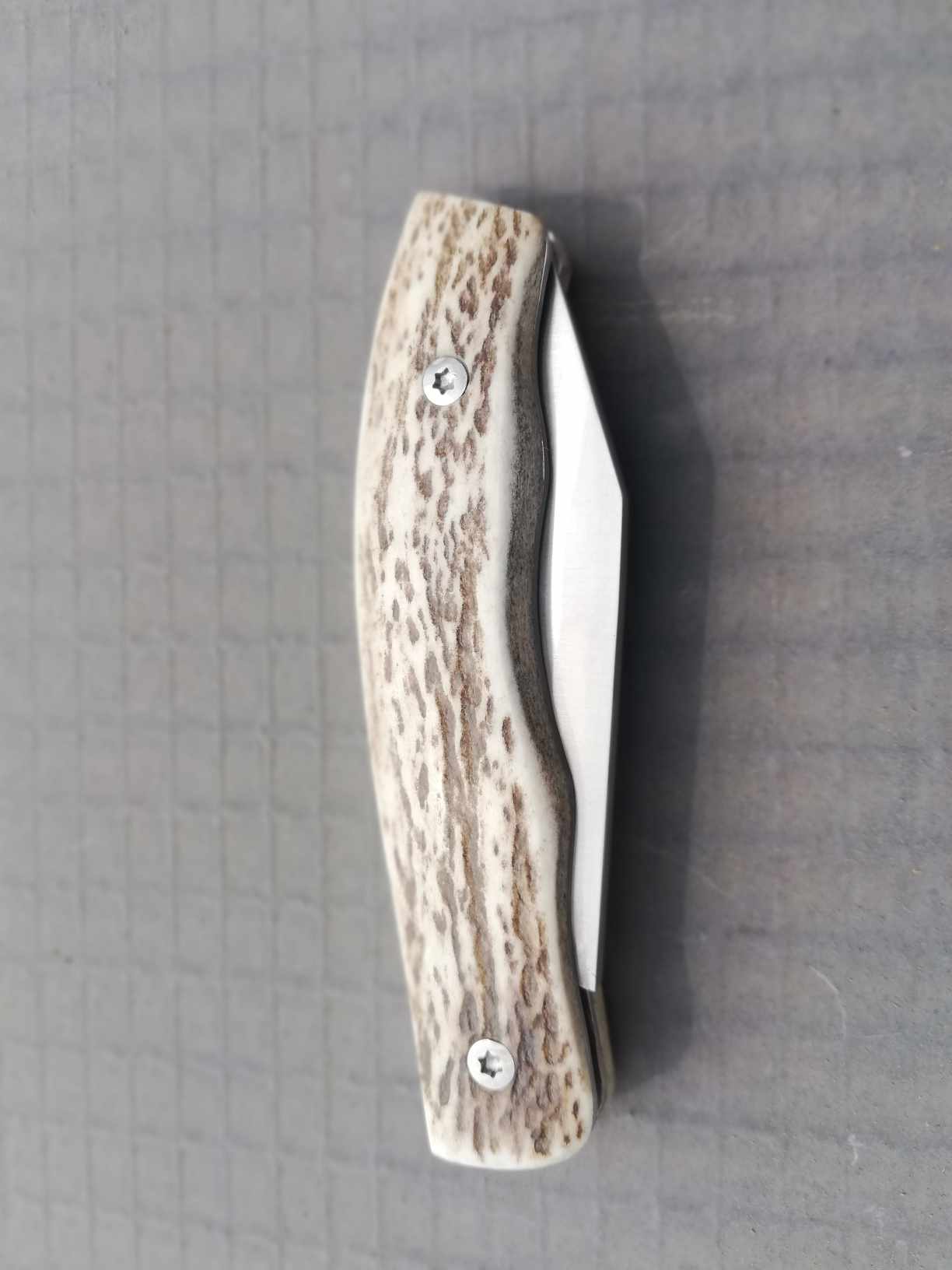 Couteau pliant à cran plat