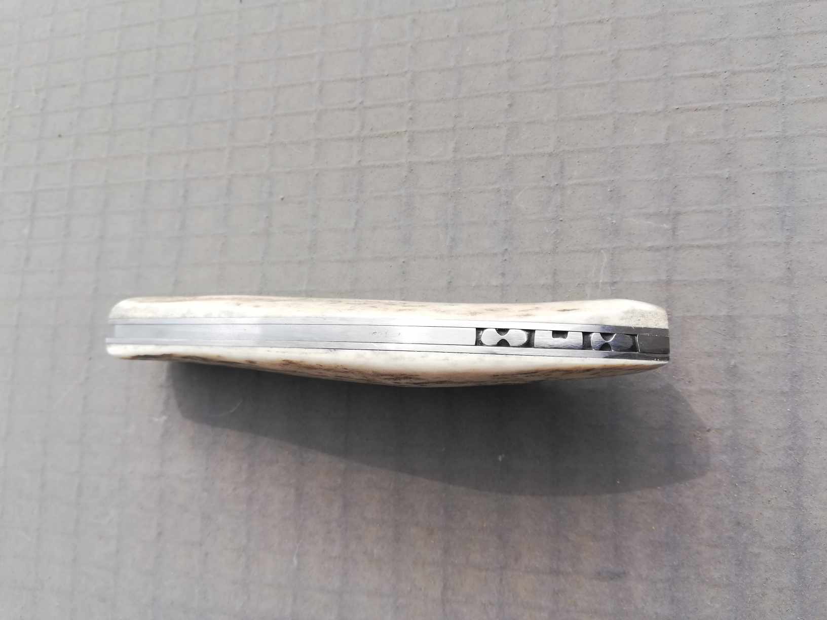 Couteau pliant à cran plat