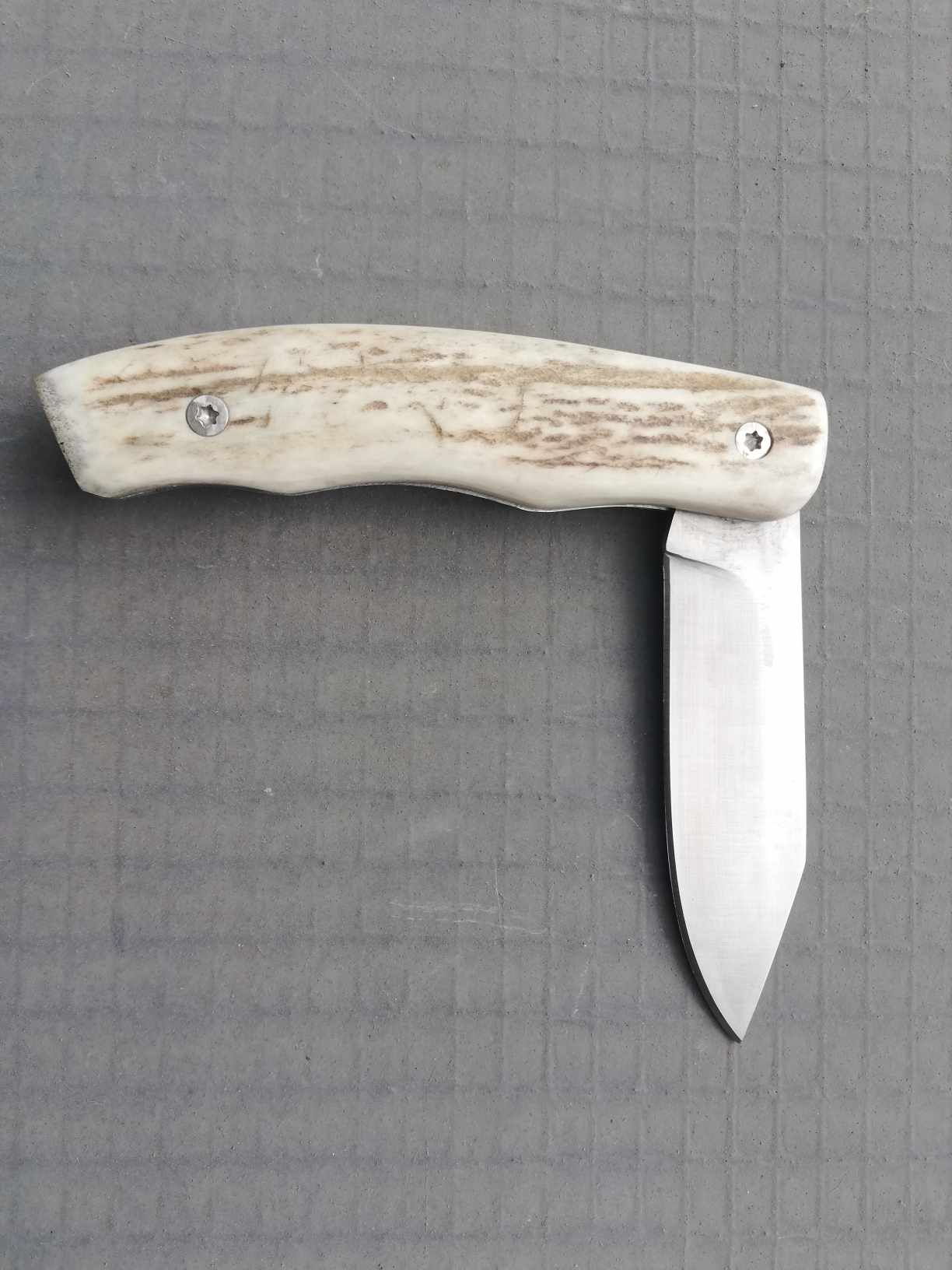 Couteau pliant à cran plat