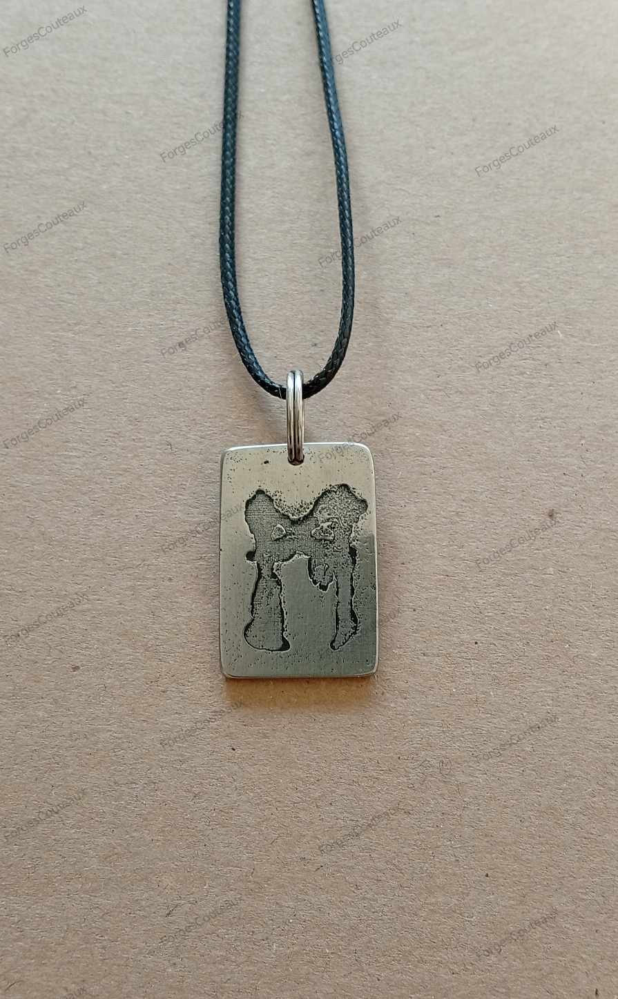 Pendentif original en métal inoxydable